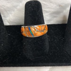 Inlayed stones spiny shell and opal